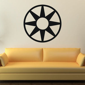 Black sunburst wall decal with circular center and radiating rays