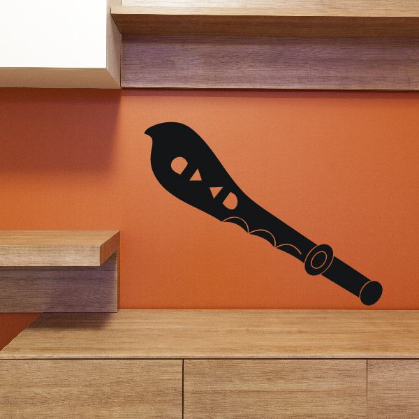 Black sword wall decal with ornamental details and handle flourish