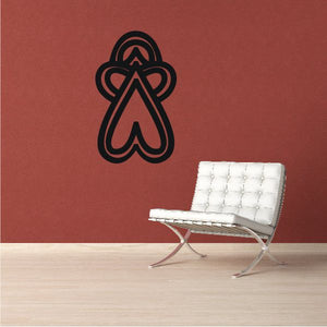 Upside-down heart art decal with black knot-like design