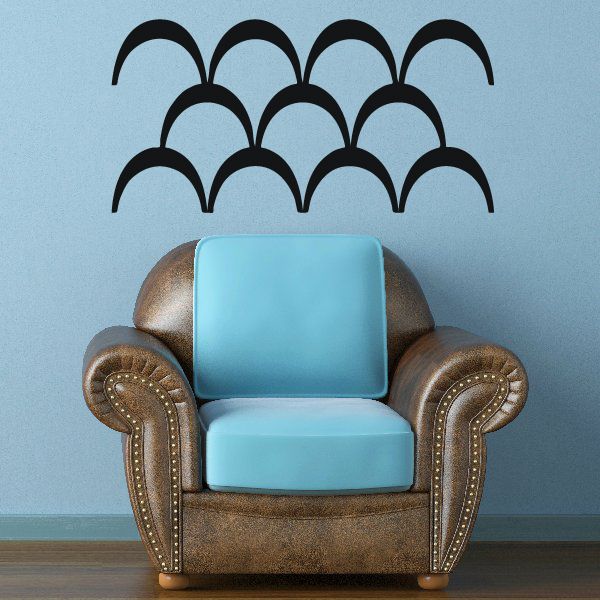 Decorative wave pattern decal with bold black arched arches on a light background