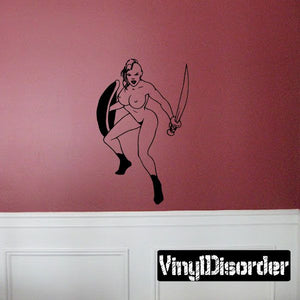 Wall decal of bare-chested shieldmaiden with sword, black outline