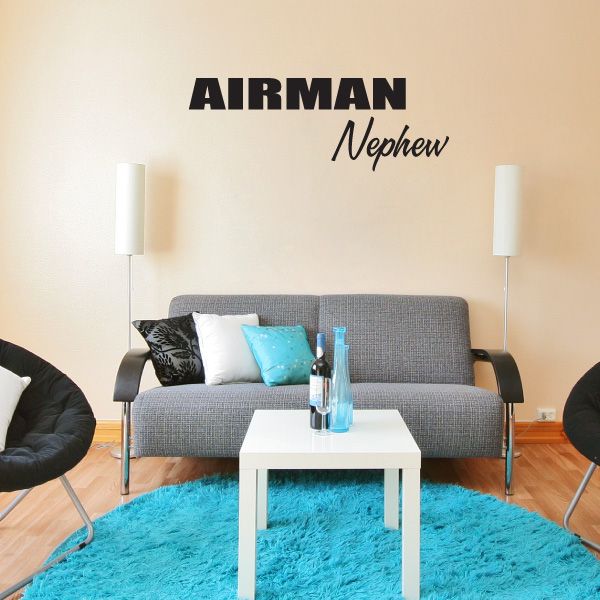Black vinyl wall decal: “AIRMAN” and “Nephew” lettering