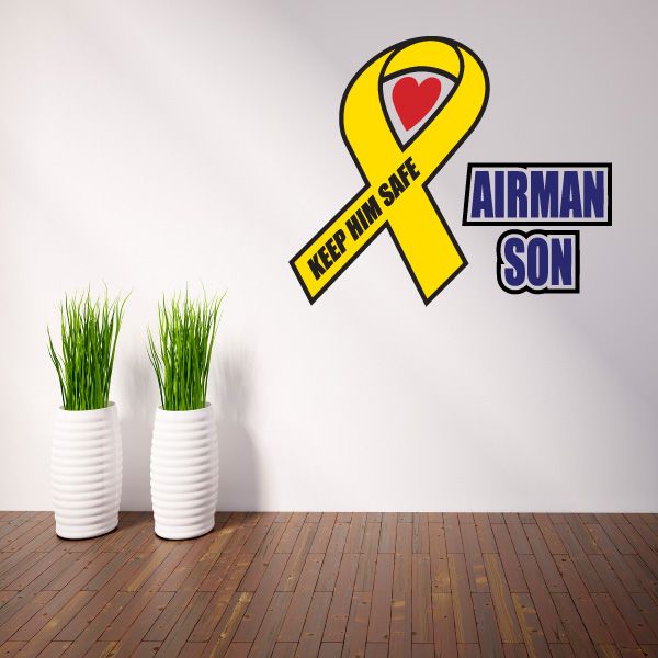 Yellow safety ribbon decal with heart and text 'KEEP HIM SAFE', 'AIRMAN SON'