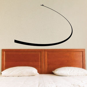 Airplane swoop wall decal: black curved swoosh with small airplane mark