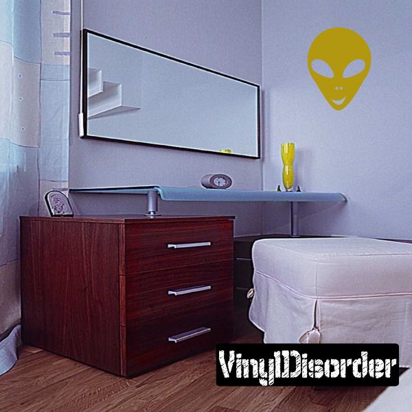 Alien smile decal with yellow alien face and smiling mouth