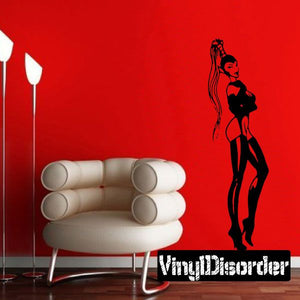 Alien stripper wall decal, black pinup-style figure with raised hand and stylized body art