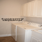 Laundry room wall decal with text 'All laundry supplies are up on the shelf'