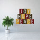 Multicolor tile-printed wall decal reading JOY HOPE PEACE