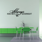Wall decal with black script text: Always KISS ME GOODNIGHT and small floral accents