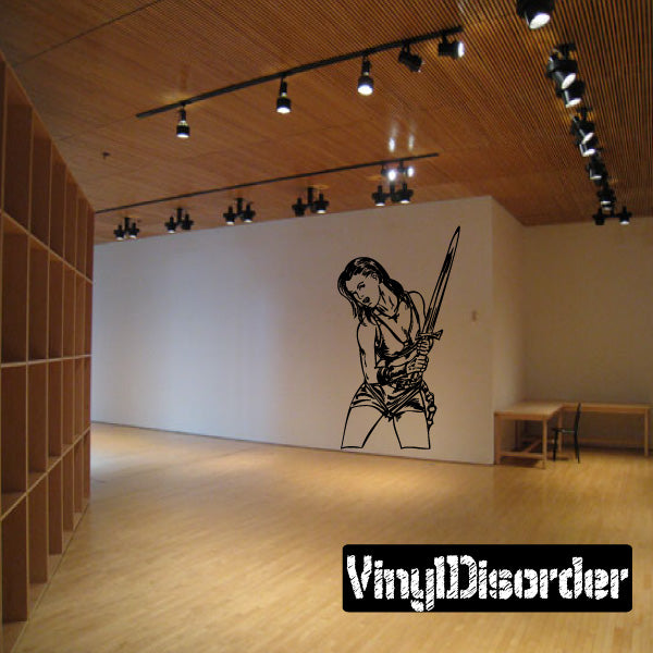 Vinyl wall decal of Amazon woman holding a spear, black line art