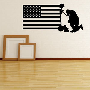 American flag and fallen soldier decal with kneeling silhouette