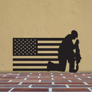 American flag and soldier decal with dark kneeling silhouette and stars-and-stripes flag