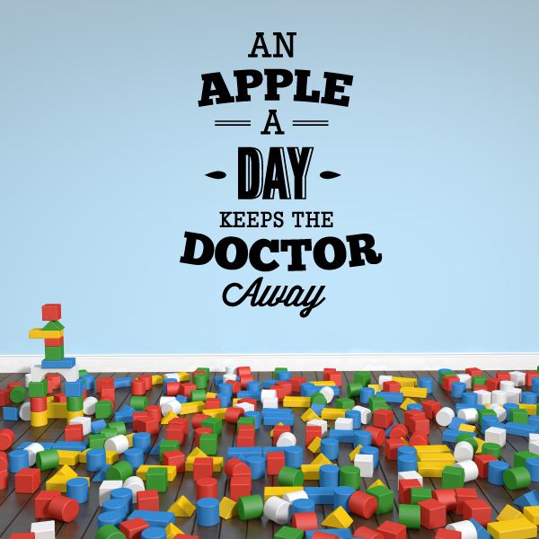 Decorative wall decal with 'An apple a day' and 'keeps the doctor away' text