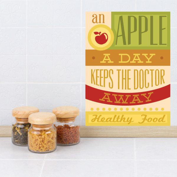 Apple quote sticker reading 'An apple a day keeps the doctor away'