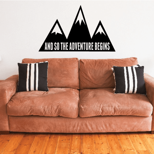 Black mountain wall decal with white text and peak silhouettes