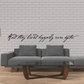 Wall decal with cursive quote 'and they lived happily ever after' in black