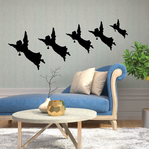 Wall decal set of black angel horn silhouettes with multiple figures flying