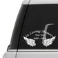 Black memory wings car sticker with white angel wings and cursive 'In Loving Memory'.