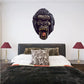 Angry ape face sticker, snarling black and gold with open mouth