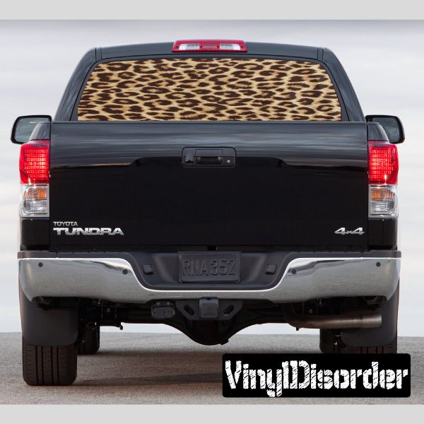 Cheetah print rear window graphic cover for pickup truck, brown and black pattern