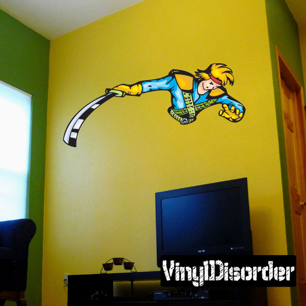Anime fighter sticker of blond character aiming a rifle in profile