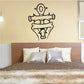 Ankh with ribbon wall decal in black outline on a light surface