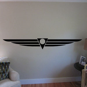 Antique wings wall decal with central round emblem, black
