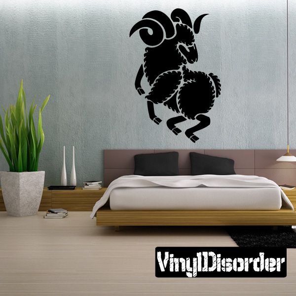 Black ram head wall decal with curled horns and detailed silhouette.