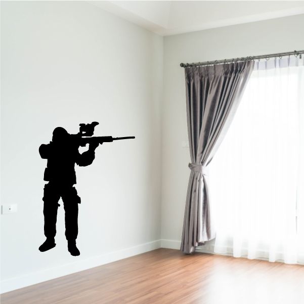 Black armored soldier aiming rifle wall decal silhouette