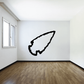 Right-pointing arrowhead wall decal, black vinyl shape on wall
