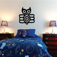 Art deco owl wall decal with circular eyes and geometric lines