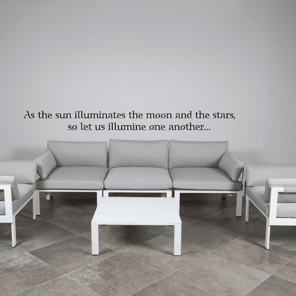 Wall decal with inspirational quote text in black, centered on wall