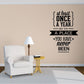 Black quote wall decal: at least once a year, go to a place you have never been.