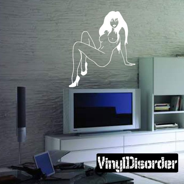 White outline wall decal of a woman in heels posing with one hand to her face