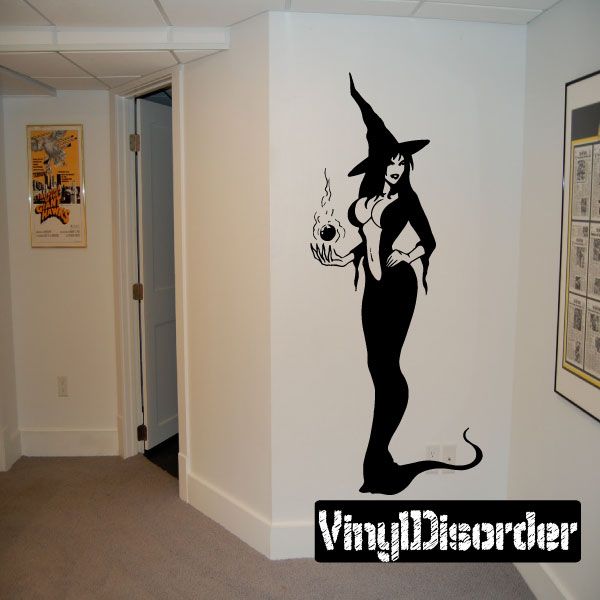 Black witch silhouette decal holding a cauldron, with cat-like tail