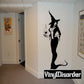 Black witch silhouette decal holding a cauldron, with cat-like tail