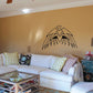 Aztec eagle wall decal in black line art, spread wings and patterned feathers.
