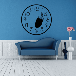 Black-outlined wall clock decal with baby holding toy, numbered 1–12