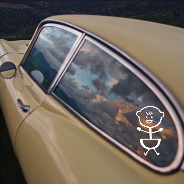 Baby face hair decal with smile and brush icon, white outline on dark surface