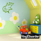 Green baby shark wall decal with dotted outline and open mouth.