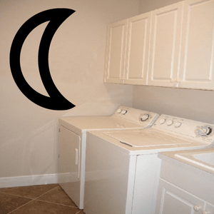 Crescent moon wall decal with black moon-crest design