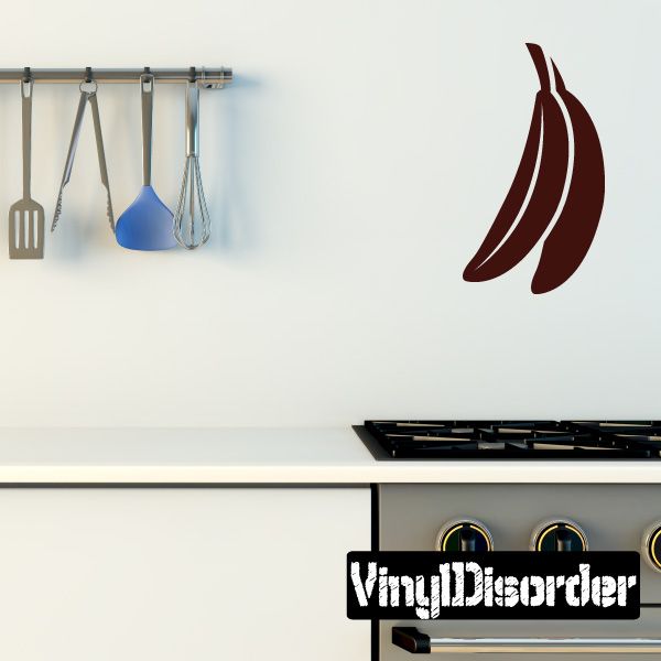 Brown banana wall decal, three curved shapes with dark outlines