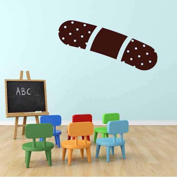 Band Aid decal showing a brown bandage with white speckles and adhesive edges
