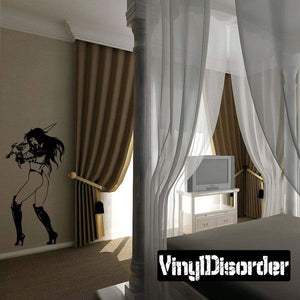 Warrior woman wall decal with black silhouette and raised swinging sword