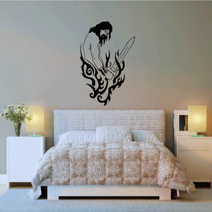 Black barbarian tribal wall decal with warrior face and sword graphic