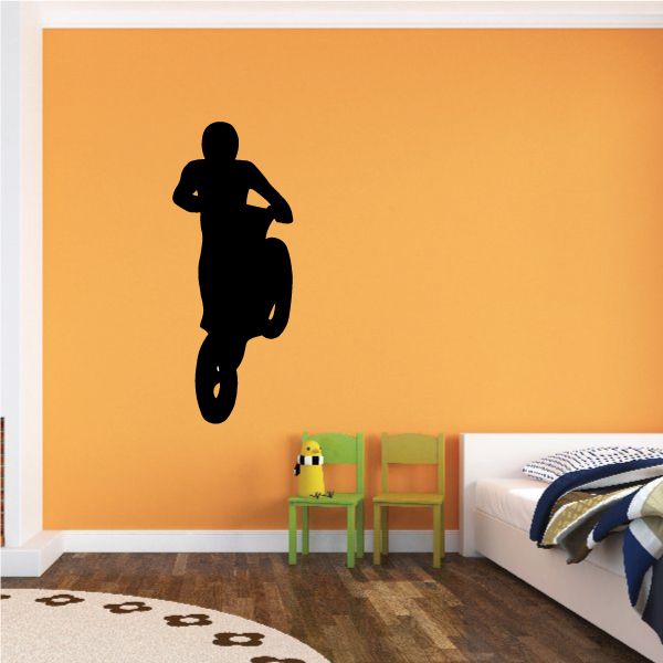 Dirt bike decal with black motocross rider silhouette mid-jump