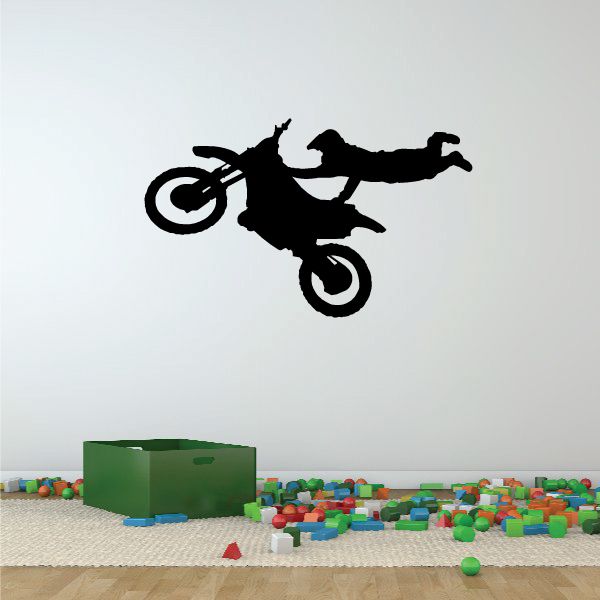 Dirt bike decal with black silhouette rider performing one-hand grab on bike