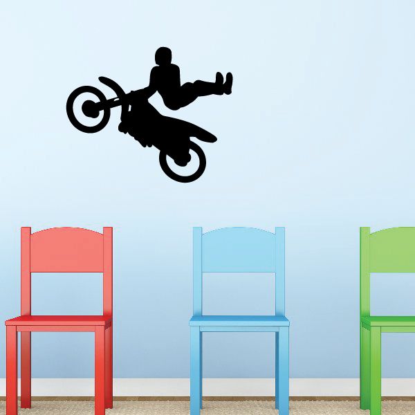 Black dirt bike decal with rider silhouette and target-style wheel rings