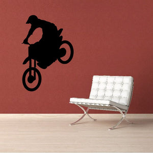 Black dirt bike stoppie decal sticker with wheelie silhouette and circular tire shapes