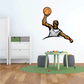 Basketball wall decal featuring a player dunking with a basketball